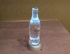 coca cola bottle salt lake with light / met licht