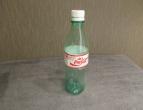 coca cola bottle england plastic / nr 4009